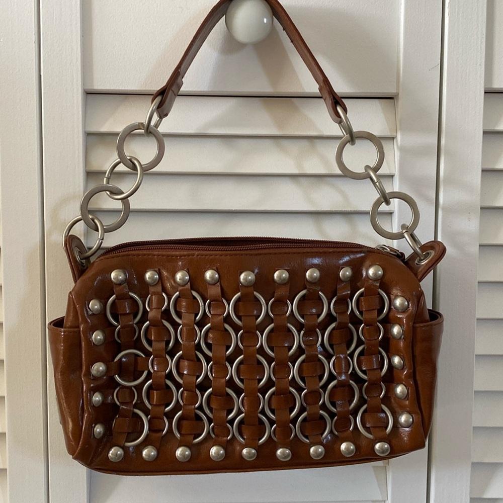 Brown “ moto “ inspired Marc Ecko bag.